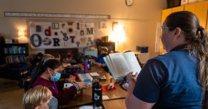 Teacher Melissa reads a story to her fifth-grade class at Jacob's Well Elementary School. (Photo: Texas Tribune)