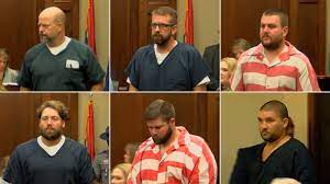 Six white men plead guilty to racially assaulting two black men inside their homes. (Photo: CNN)